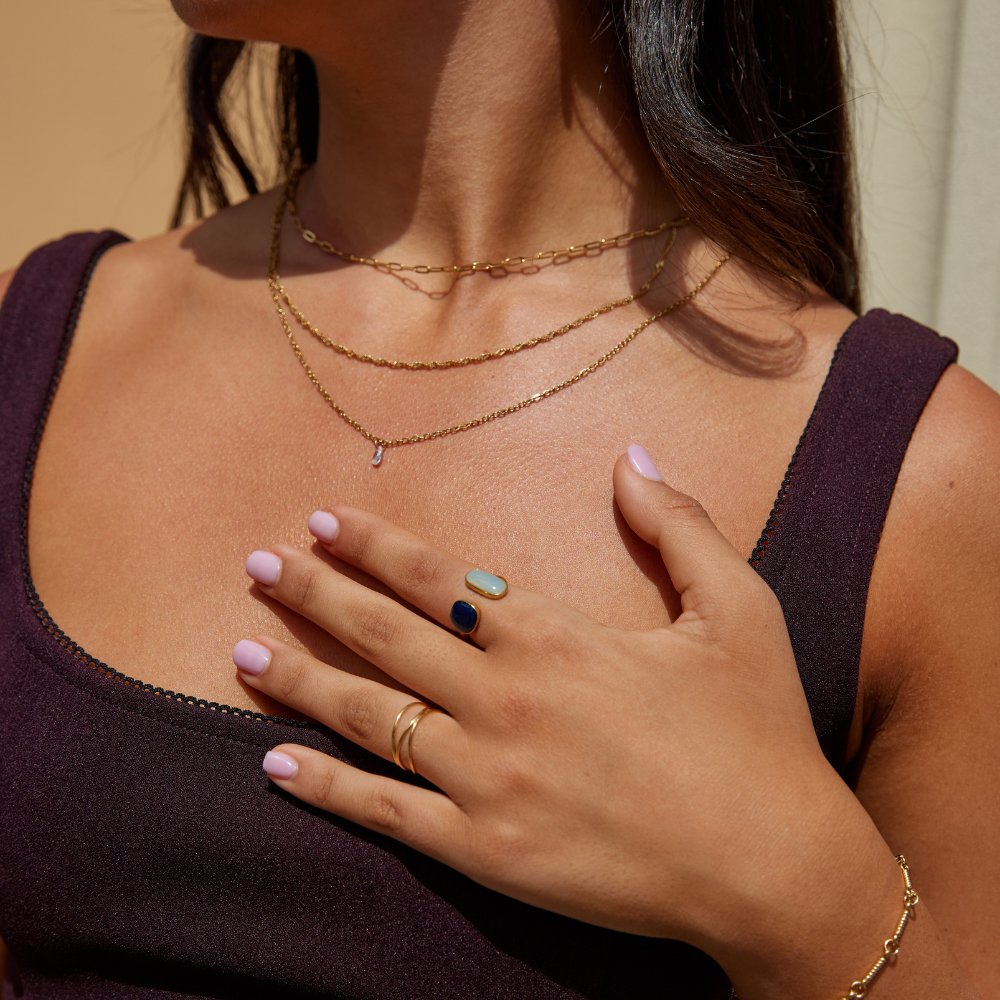 Alessandra - Anillo Envolvente de Aguamarina